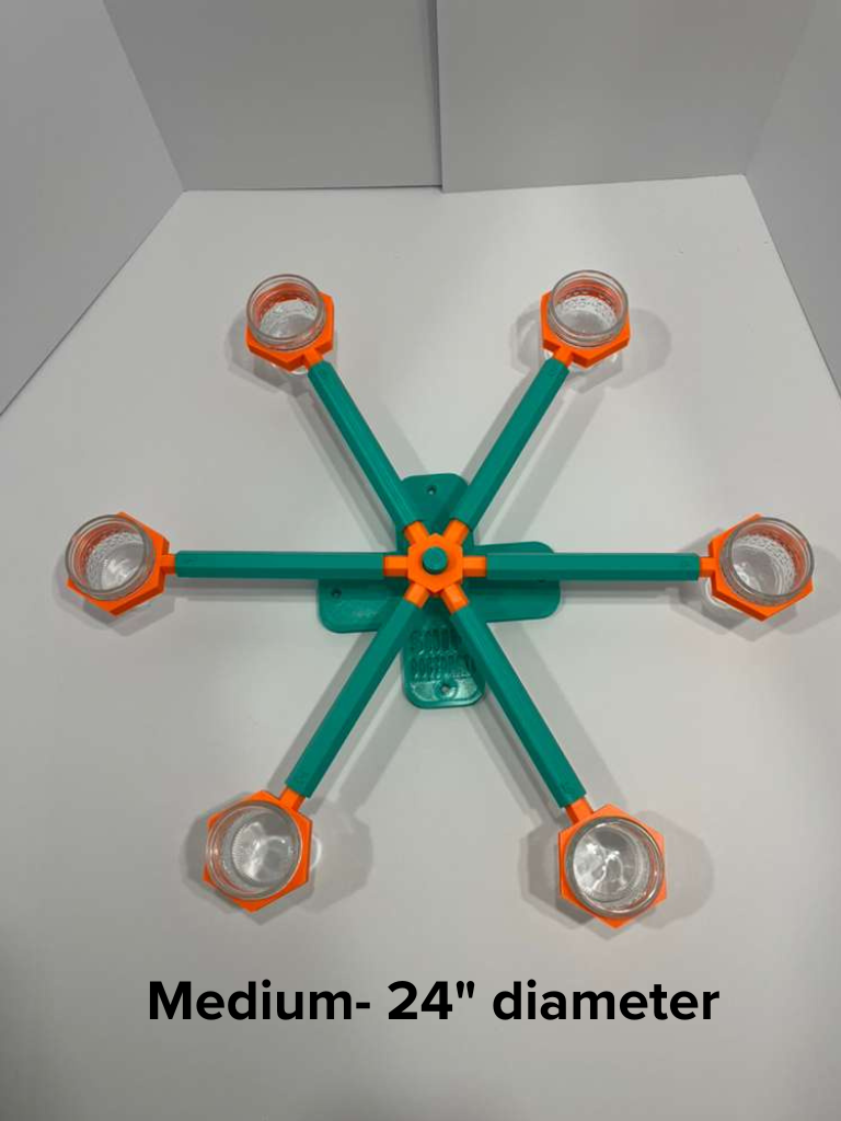 Medium 24"-inch scent wheel with bright orange scent cup holders and rotating spinners on a sturdy teal base and arms, built for professional detection dogs, AKC scent work trials, etc. scent cup holders have 4 oz glass jars for target odor. Photo is not of wheel for sale, but shown for size.