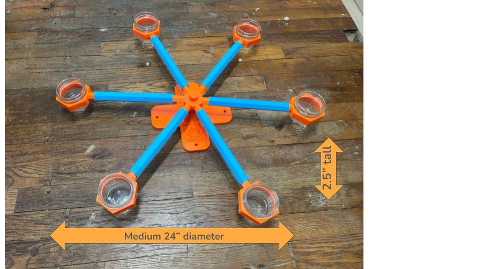 Orange and blue medium scent wheel, shown assembled with measurements. Diameter is 24" and height is 2.5". There are holes in the base to use decking screws to mount wheel higher. 