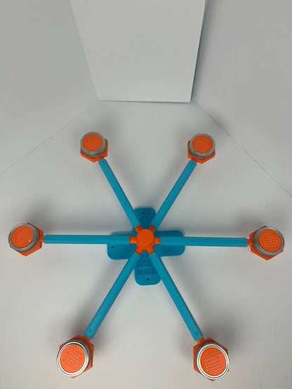 Large scent wheel with sky blue base and arms, sunny orange spinner, topper, cup covers, and cup holders