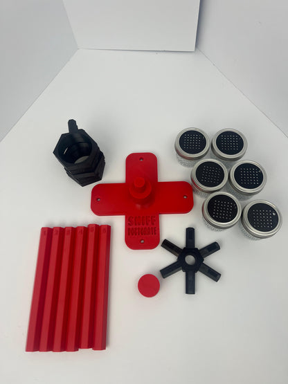 Large scent wheel with red base and arms and black spinner, cup holders, cup covers, and base topper