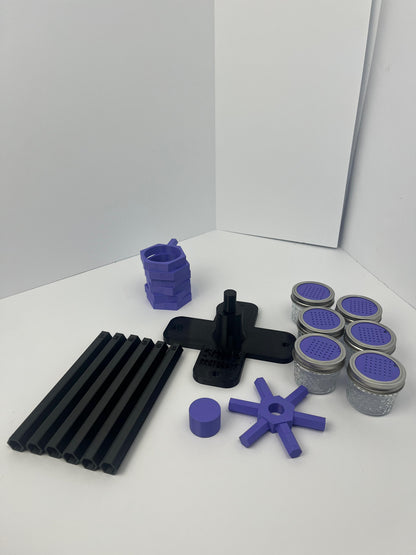 Large scent wheel with black base and arms, purple spinner, topper, cup covers, and cup holders