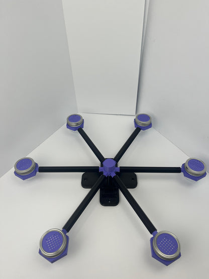Large scent wheel with black base and arms, purple spinner, topper, cup covers, and cup holders