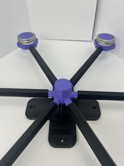 Large scent wheel with black base and arms, purple spinner, topper, cup covers, and cup holders