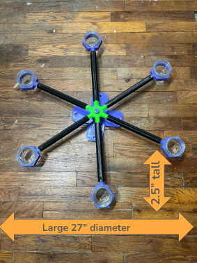 Large scent wheel on a wooden floor, showing measurements; 27 inch diameter and 2.5 inches tall.