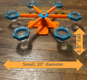 Orange and blue small scent wheel, shown assembled at a different angle. Diameter is 20" and height is 2.5". There are holes in the base to use decking screws to mount wheel higher. 